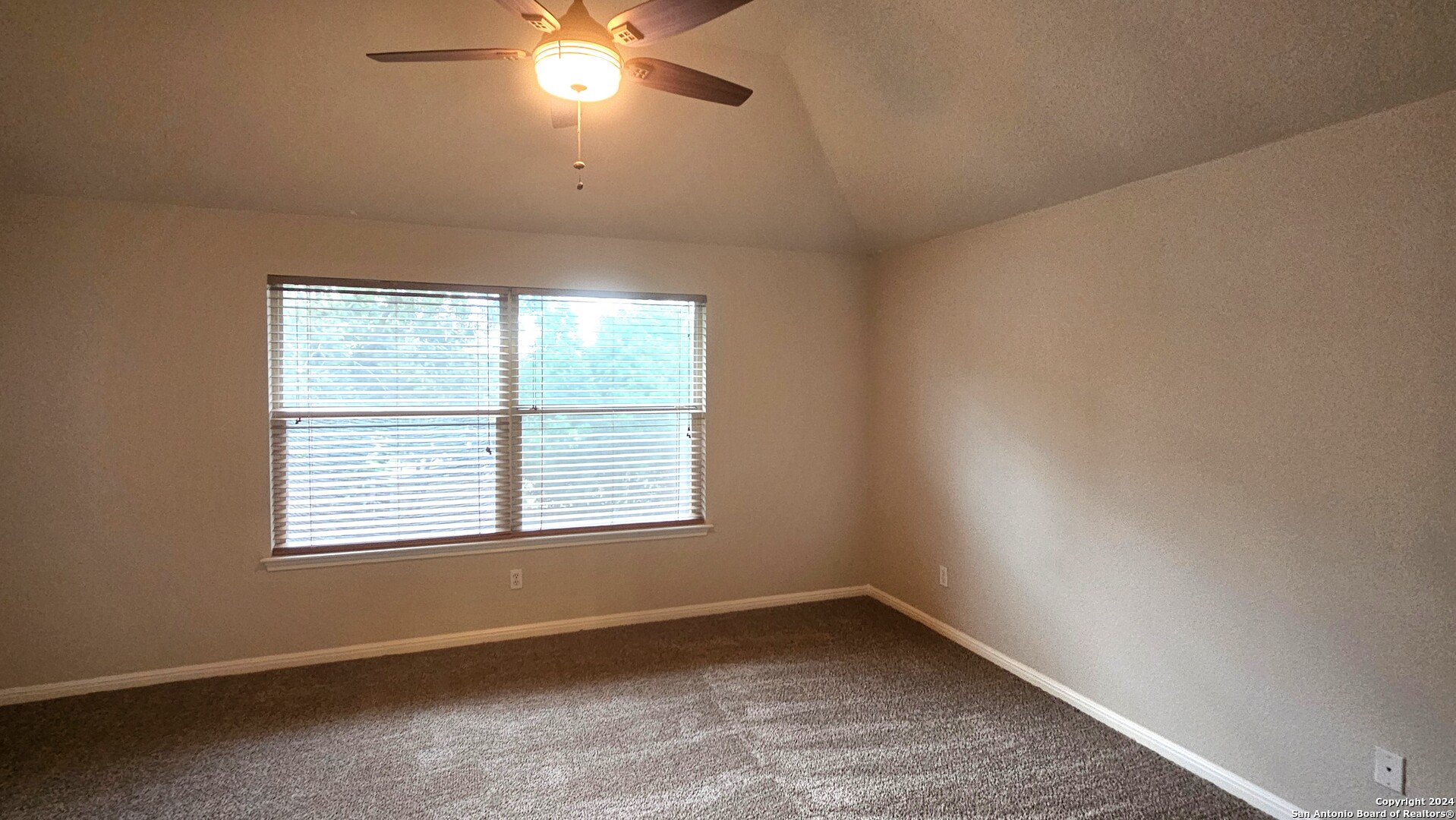 209 Storm Mt Road Cibolo, TX 78108 - Photo 20 of 28 an empty room with a window