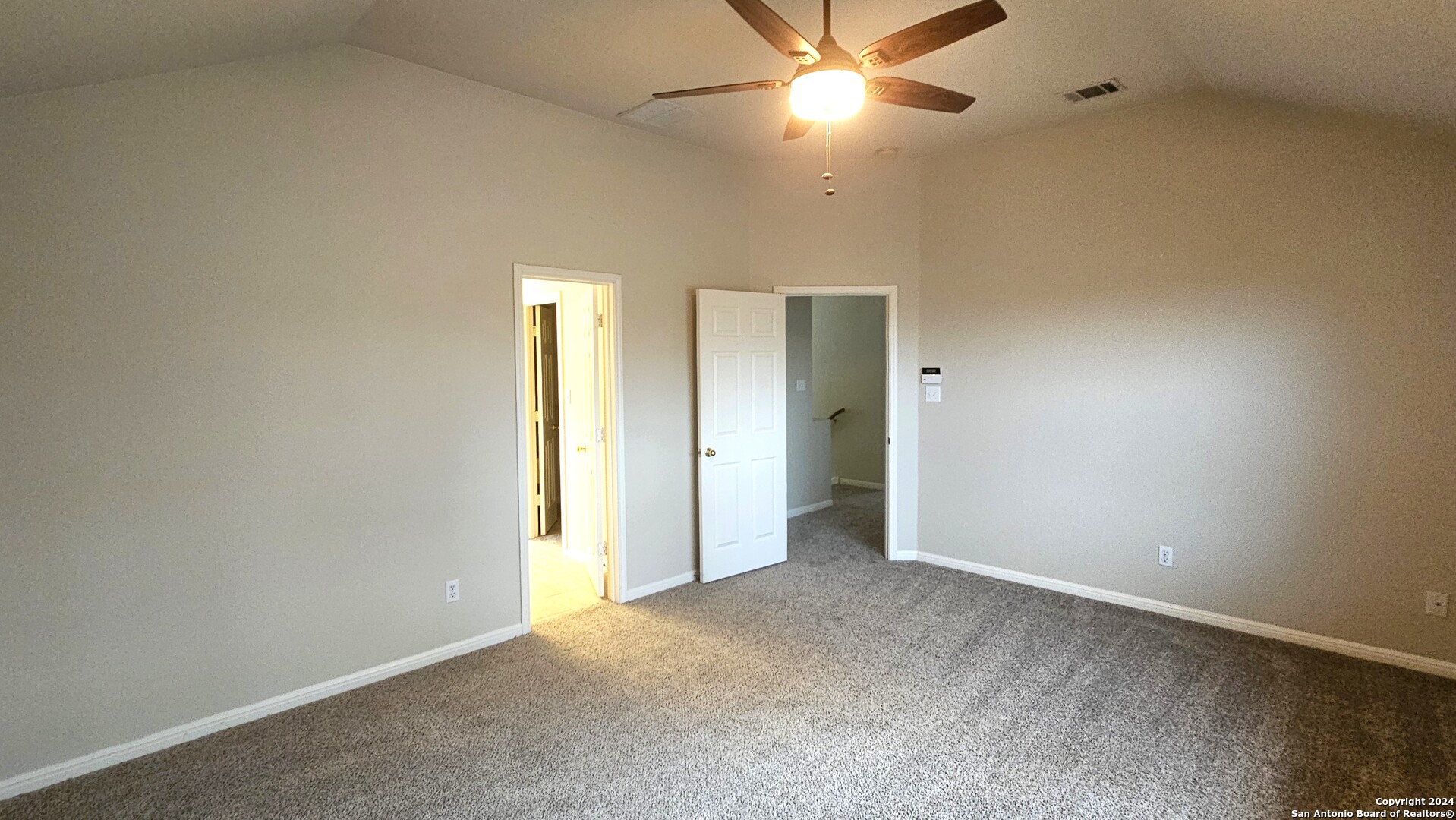 209 Storm Mt Road Cibolo, TX 78108 - Photo 21 of 28 an empty room with a fan and a fan