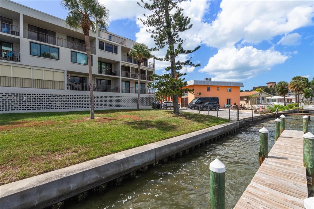 18201 Gulf Boulevard, Unit 401 Redington Shores, FL 33708 - Photo 40 of 42 a view of swimming pool with a yard