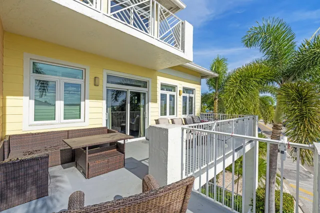 a view of house with outdoor seating
