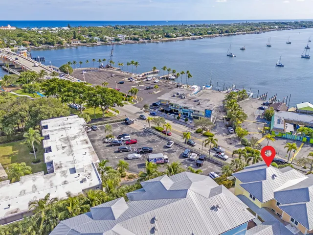 an aerial view of a houses with outdoor space