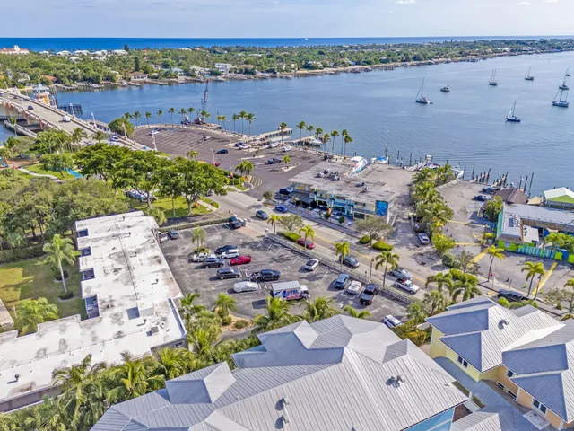 an aerial view of a house with a lake view