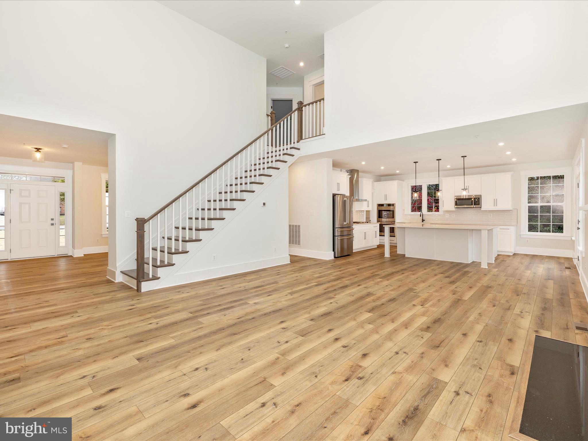 7022 Ridge Road Frederick, MD 21702 - Photo 13 of 63 a view of a kitchen with a sink and a refrigerator