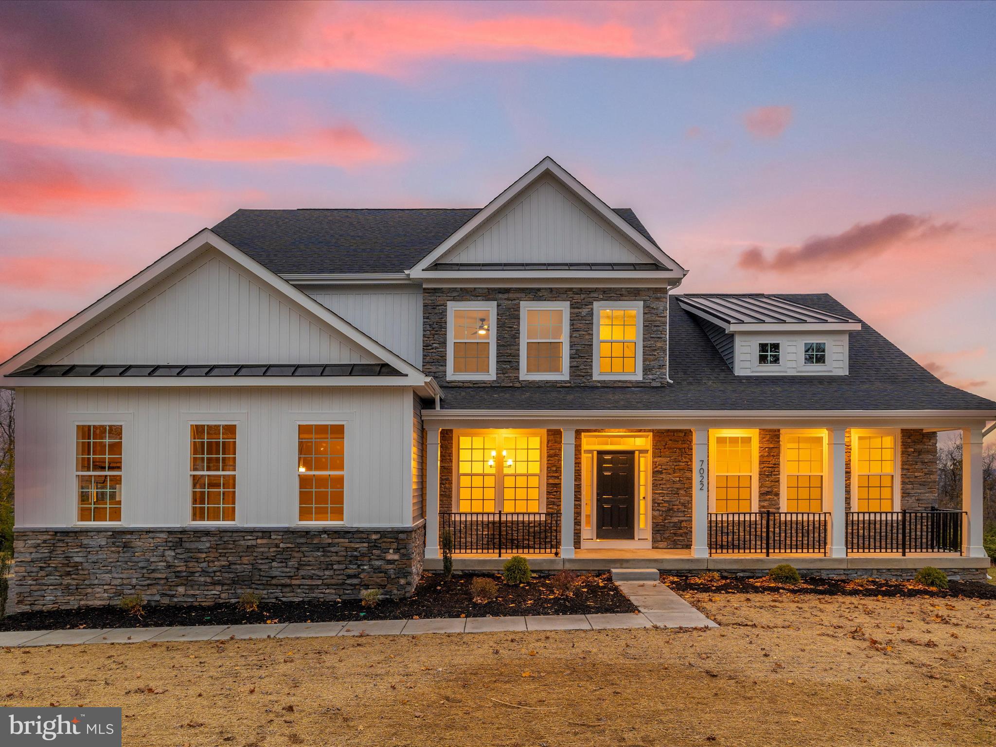 7022 Ridge Road Frederick, MD 21702 - Photo 2 of 63 a front view of a house