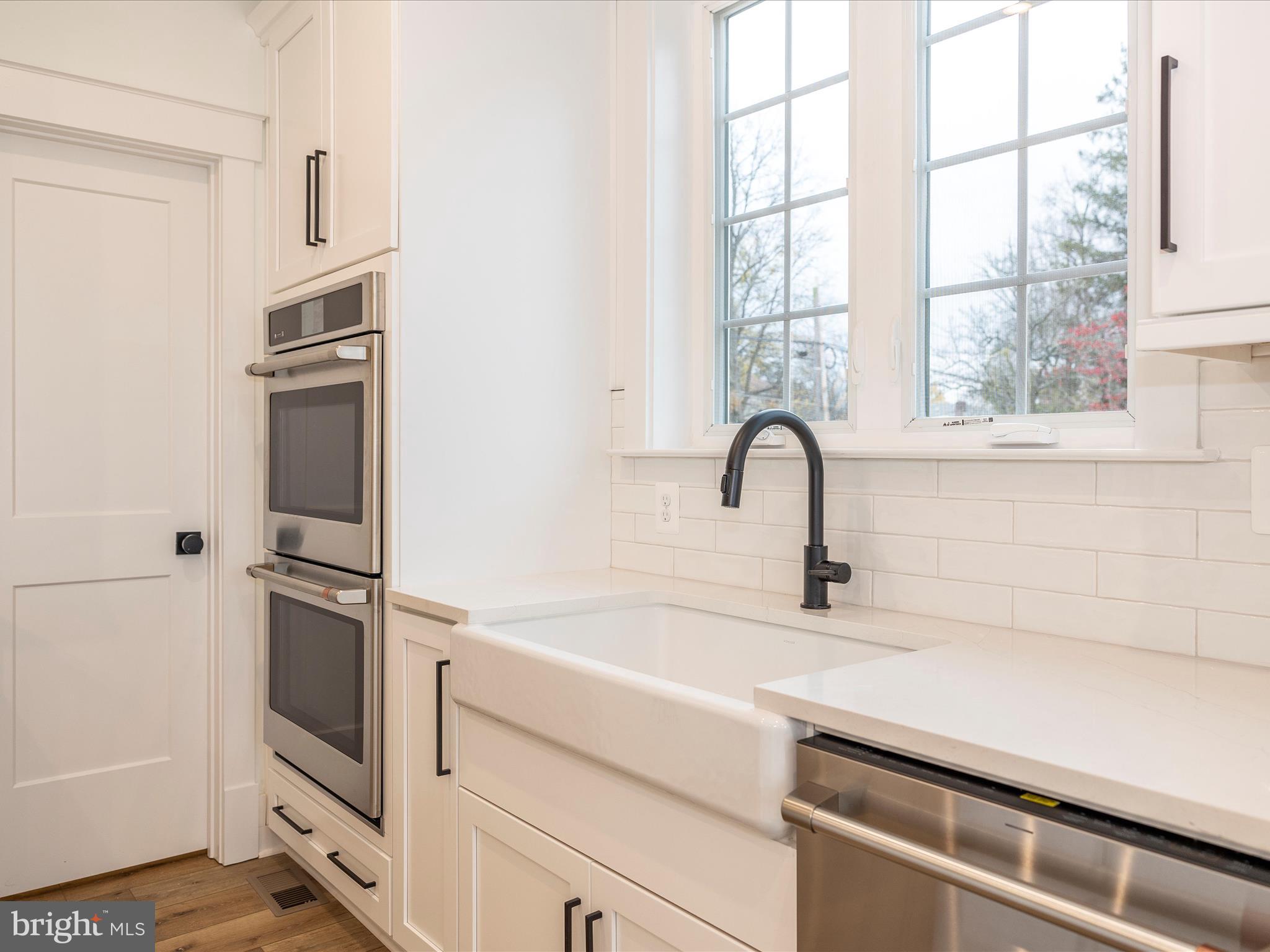 7022 Ridge Road Frederick, MD 21702 - Photo 24 of 63 a close view of a sink and a window in a kitchen