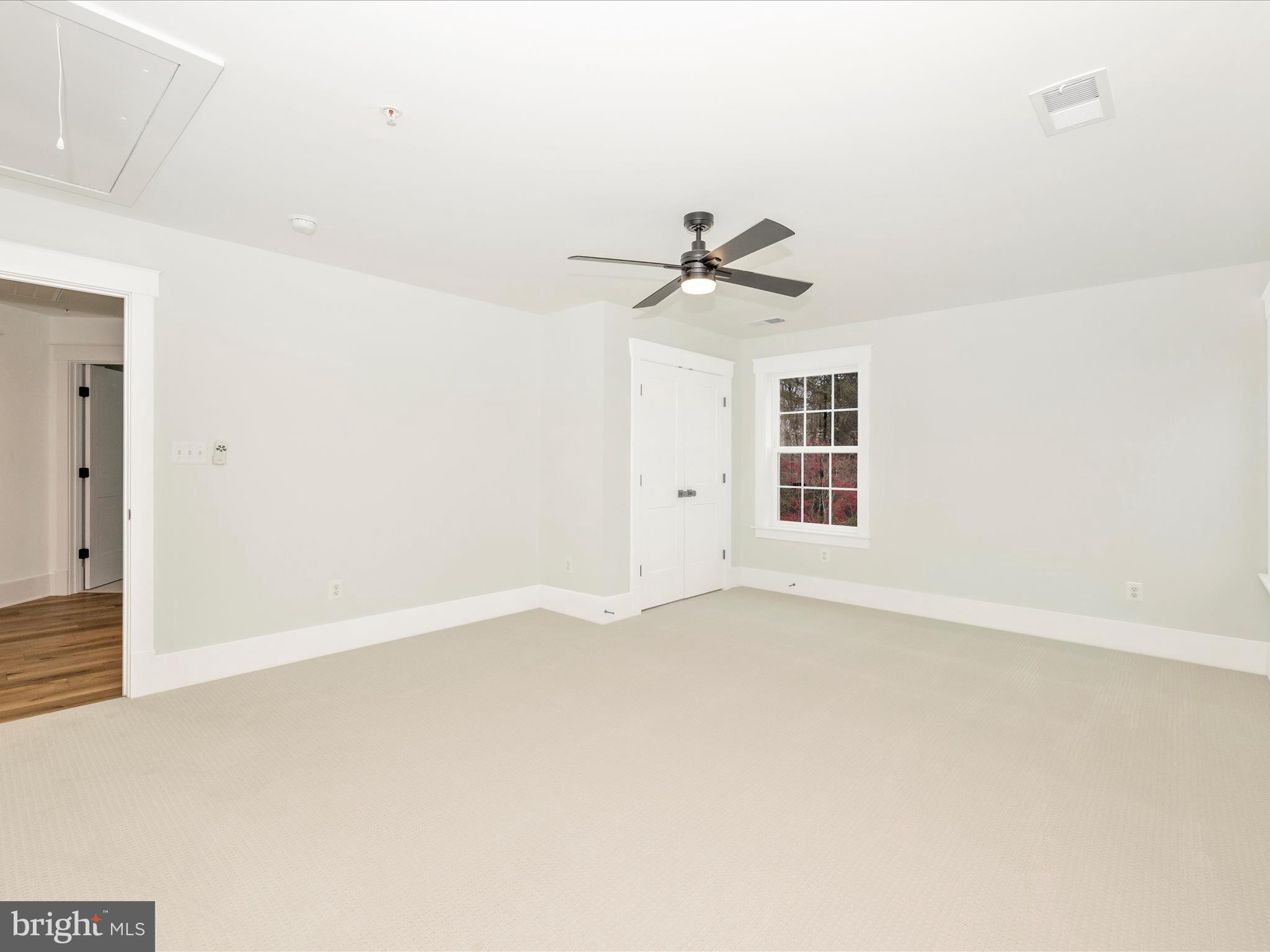 7022 Ridge Road Frederick, MD 21702 - Photo 44 of 63 a view of an empty room with a window