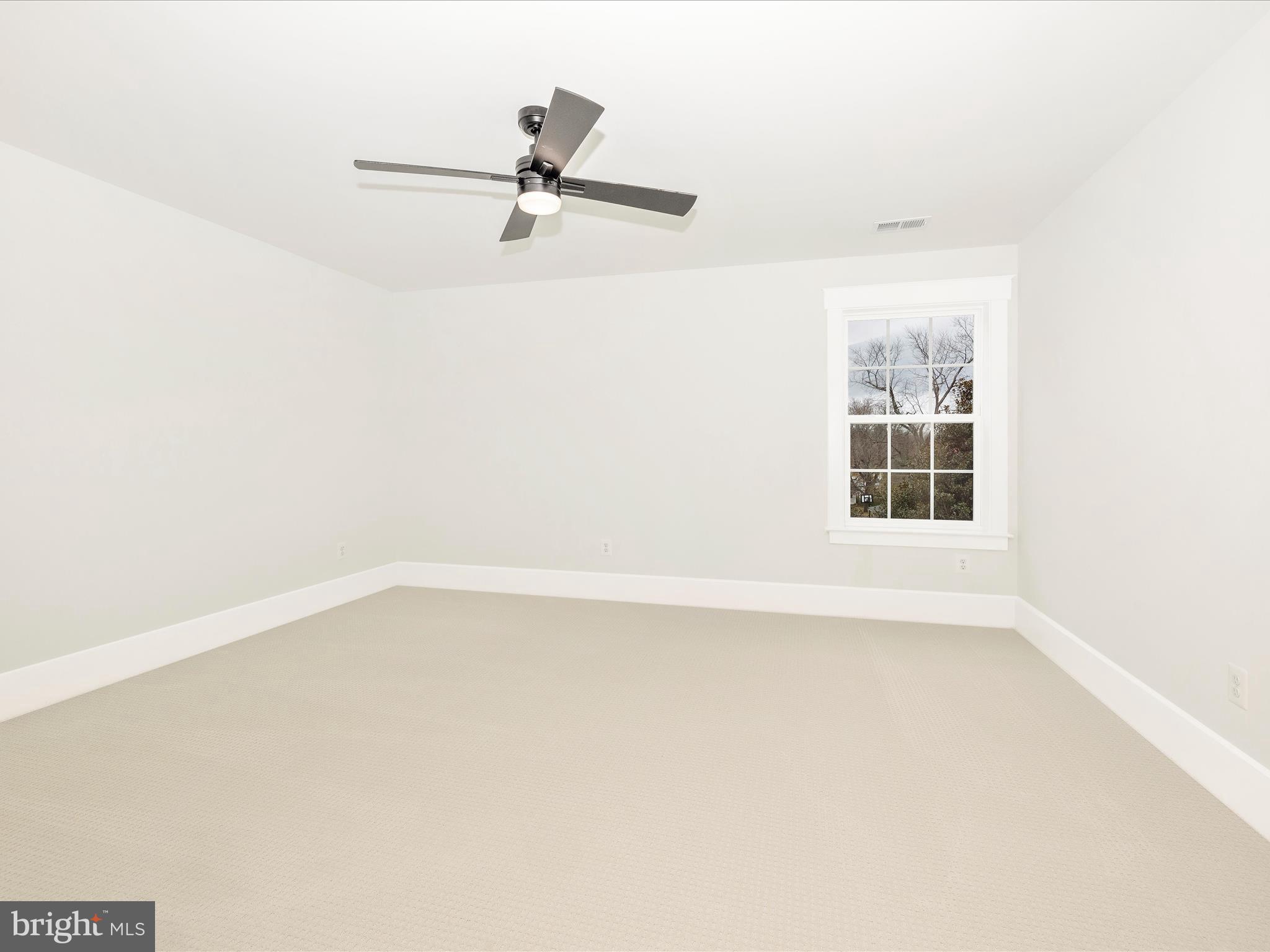 7022 Ridge Road Frederick, MD 21702 - Photo 45 of 63 a view of a room with a empty space and windows