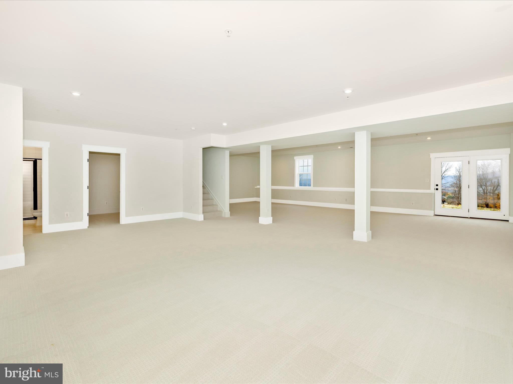 7022 Ridge Road Frederick, MD 21702 - Photo 52 of 63 a view of an empty room with a window