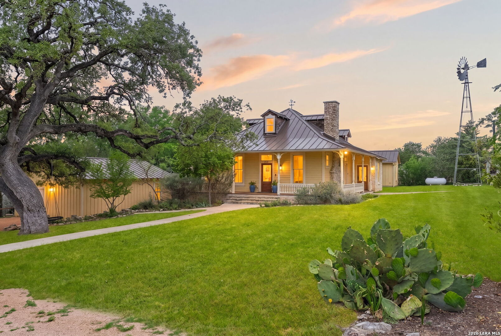 107 High Street Comfort, TX 78013 - Photo 1 of 50 a front view of a house with a yard