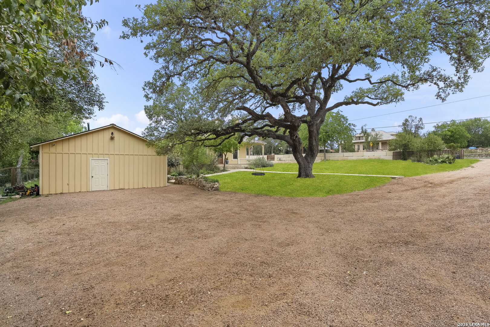 107 High Street Comfort, TX 78013 - Photo 46 of 50 a house with trees in front of it