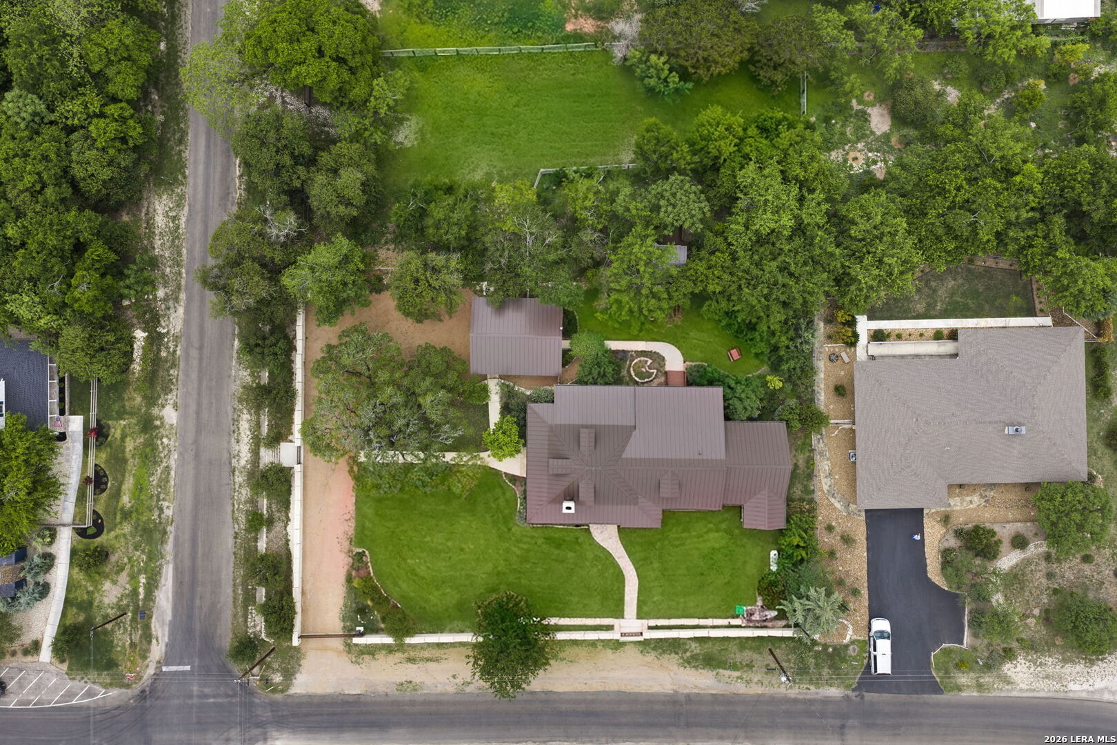 107 High Street Comfort, TX 78013 - Photo 49 of 50 an aerial view of a house with outdoor space and street view