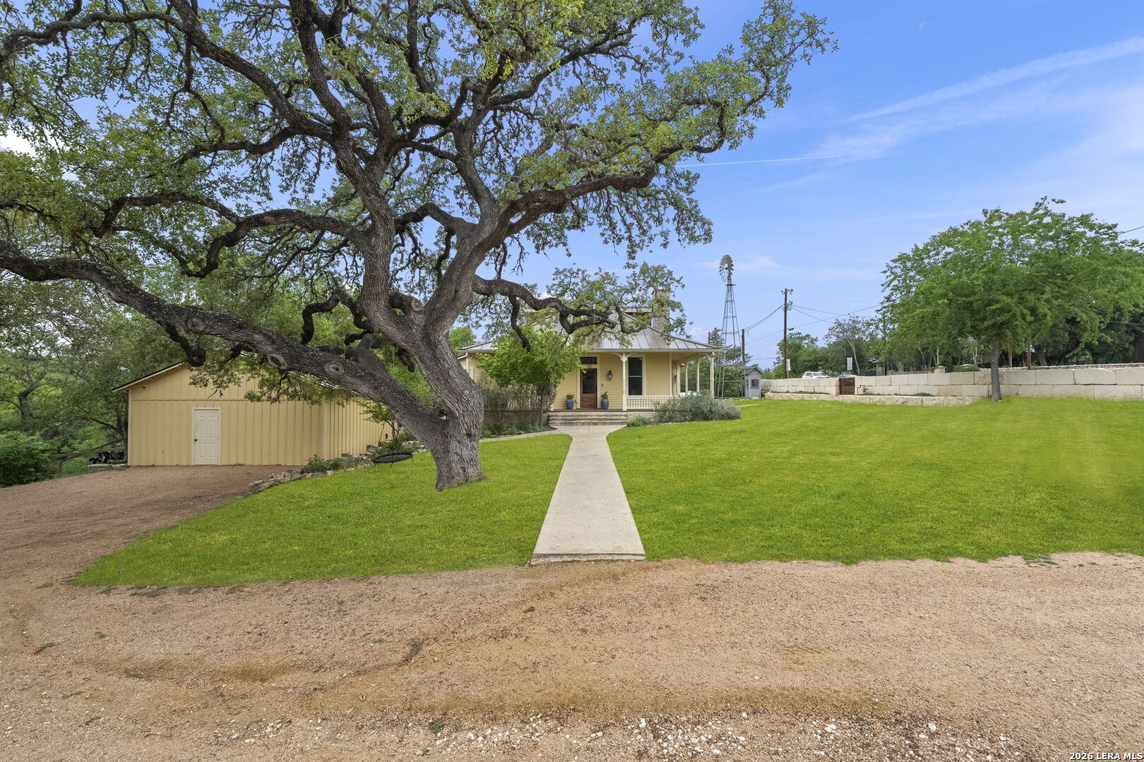 107 High Street Comfort, TX 78013 - Photo 7 of 50 a view of yard with tree in front of it