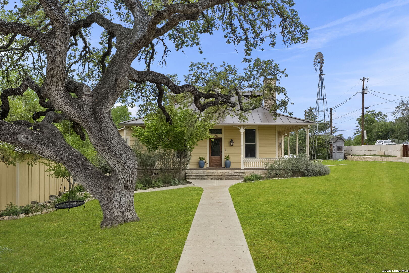 107 High Street Comfort, TX 78013 - Photo 8 of 50 a front view of house with yard