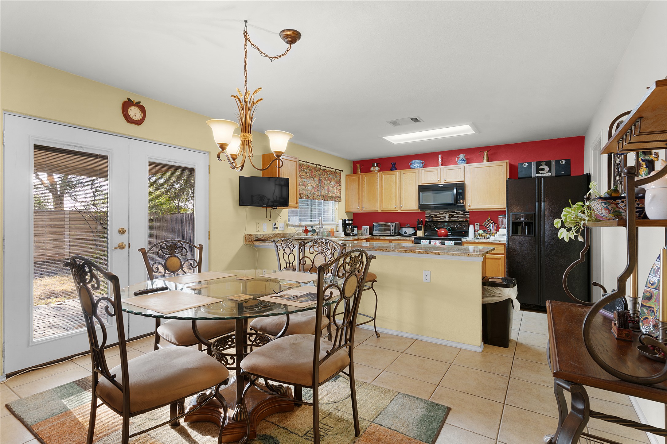 2305 Little Tree Bend Cedar Park, TX 78613 - Photo 12 of 40 a dining room filled with furniture and a chandelier