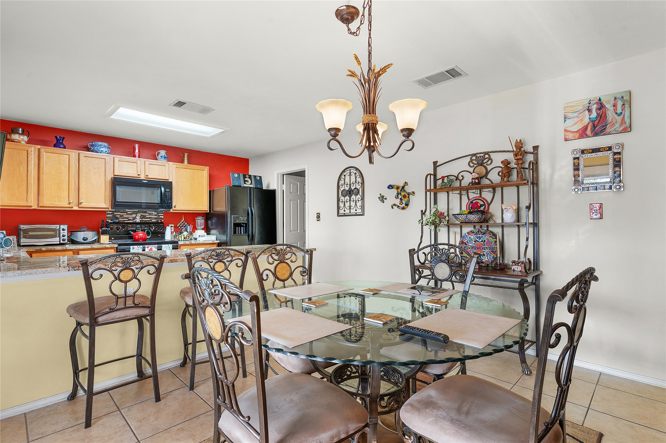 2305 Little Tree Bend Cedar Park, TX 78613 - Photo 13 of 40 a view of a dining room with furniture a chandelier and wooden floor