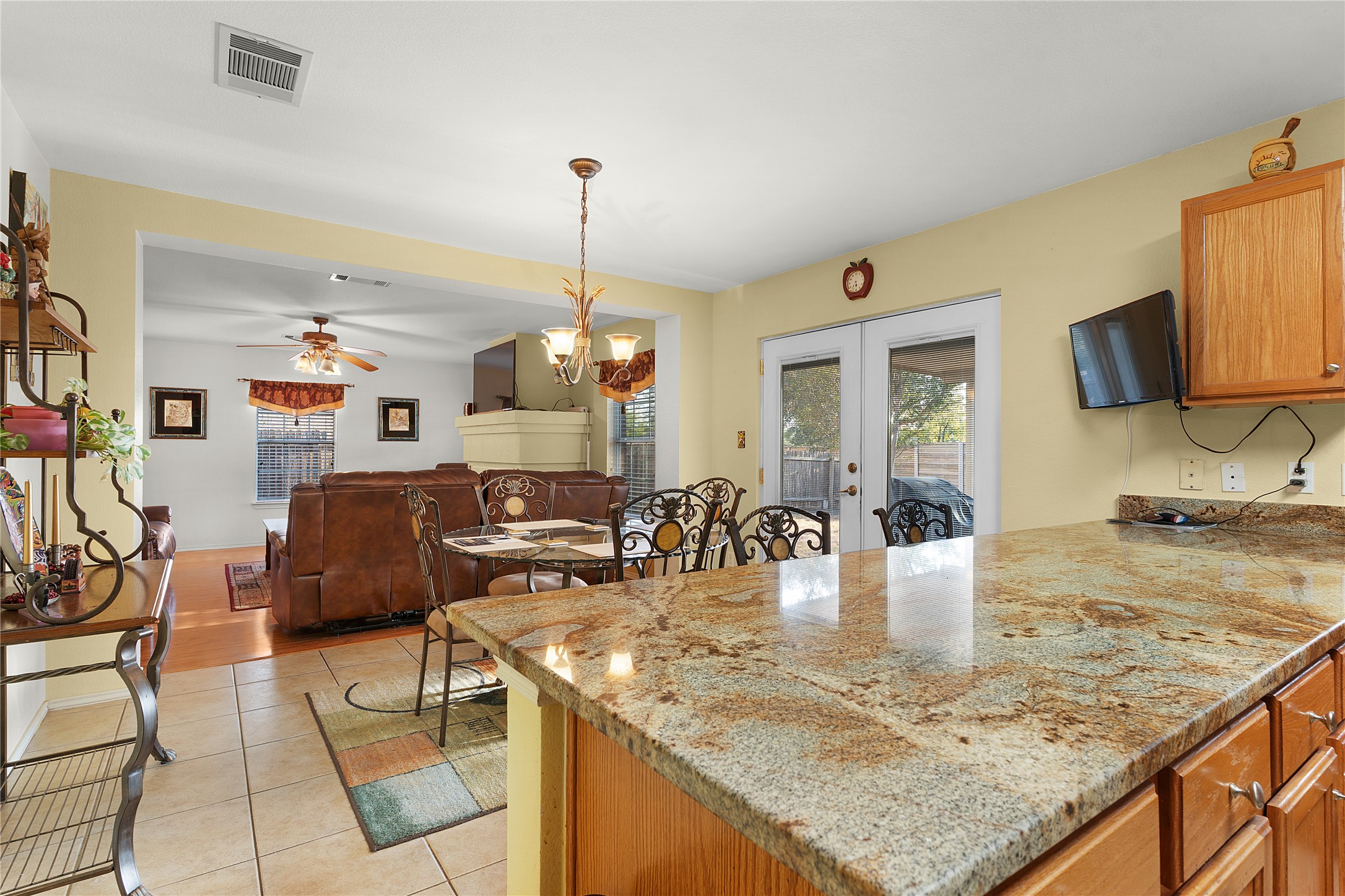 2305 Little Tree Bend Cedar Park, TX 78613 - Photo 14 of 40 a view of a kitchen with kitchen island a counter top space appliances and cabinets