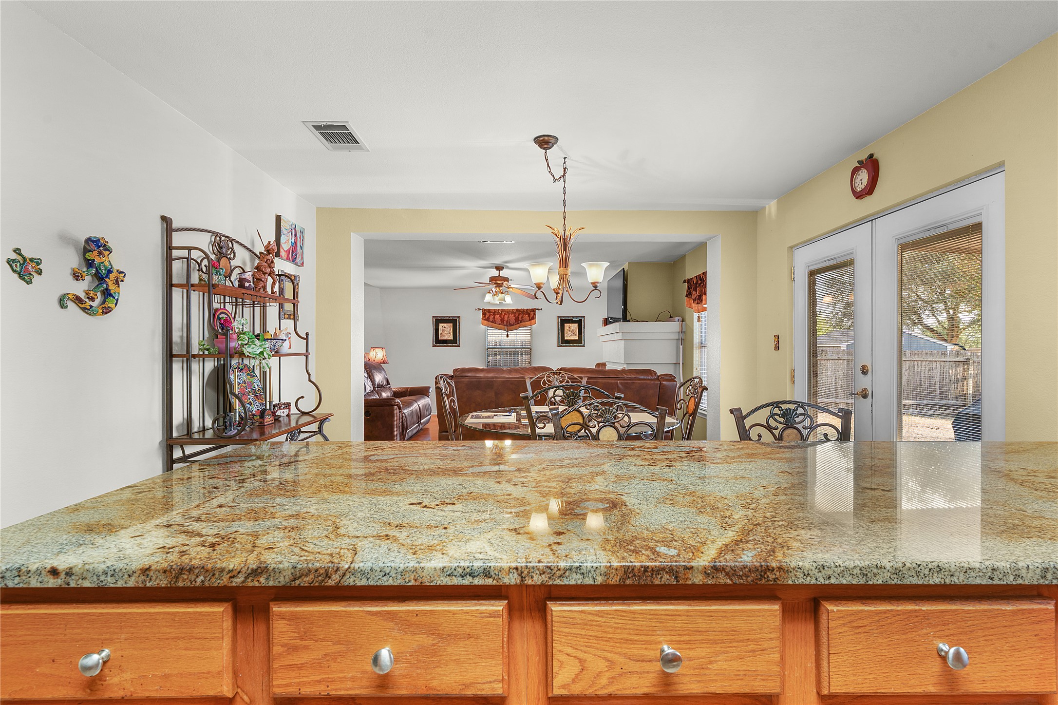 2305 Little Tree Bend Cedar Park, TX 78613 - Photo 40 of 40 a kitchen with kitchen island granite countertop a sink and a counter top space