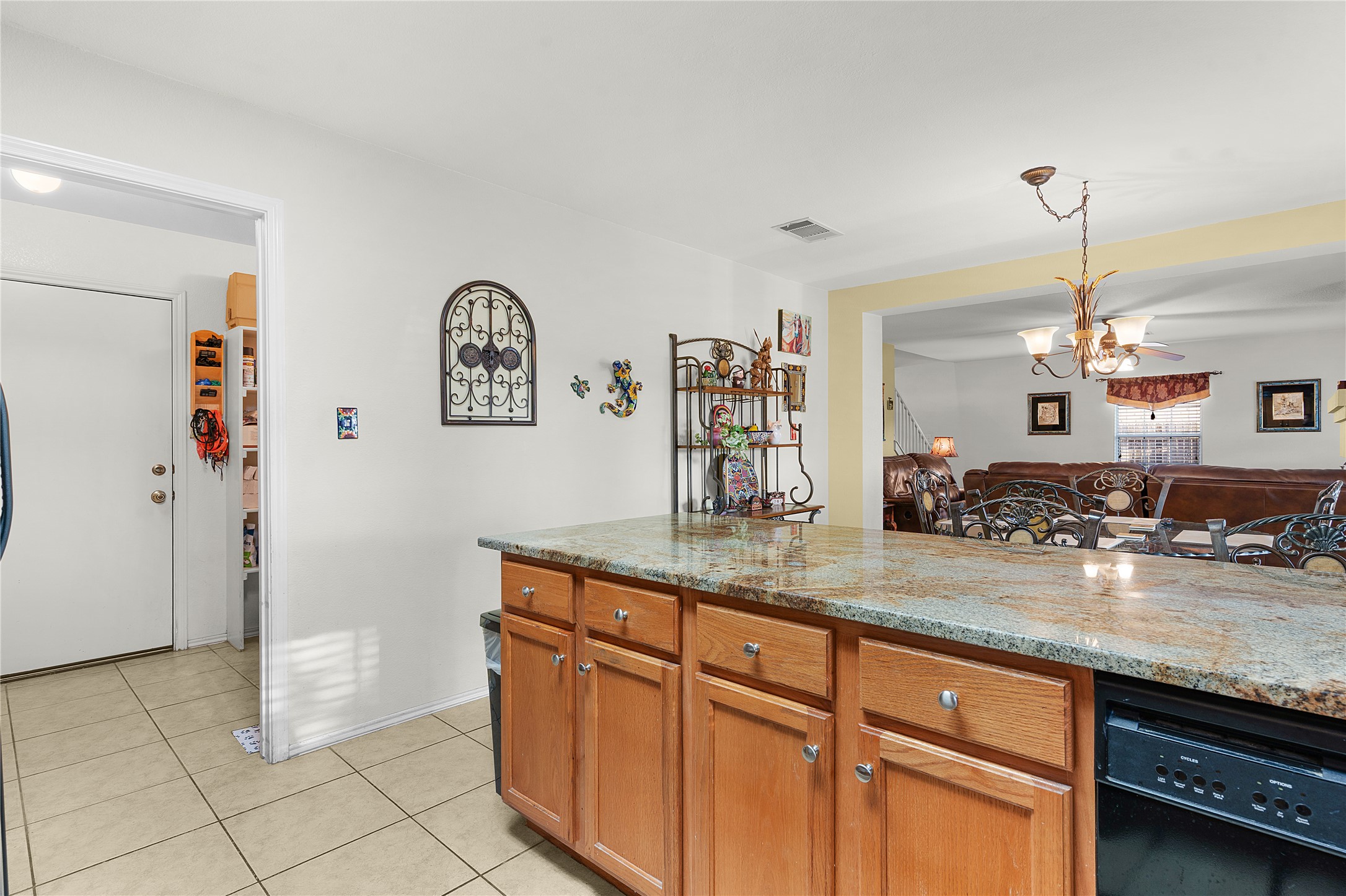 2305 Little Tree Bend Cedar Park, TX 78613 - Photo 16 of 40 a kitchen with stainless steel appliances granite countertop a sink and a refrigerator