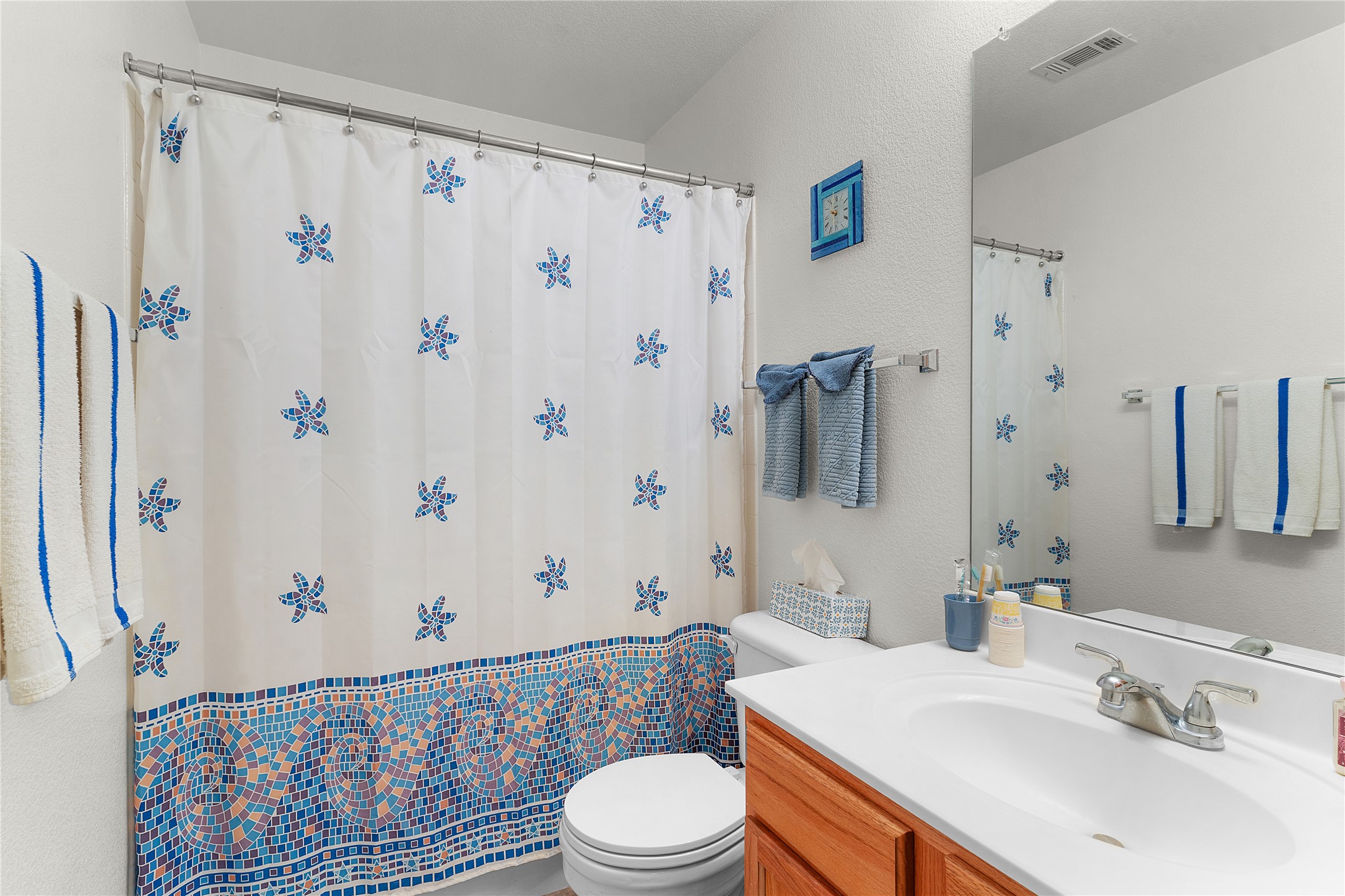 2305 Little Tree Bend Cedar Park, TX 78613 - Photo 27 of 40 a bathroom with a sink toilet and shower
