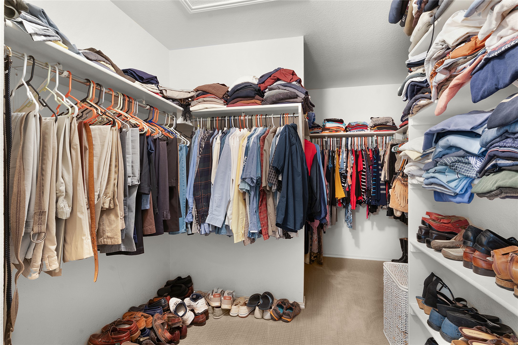 2305 Little Tree Bend Cedar Park, TX 78613 - Photo 30 of 40 a view of walk in closet with clothes and shoes