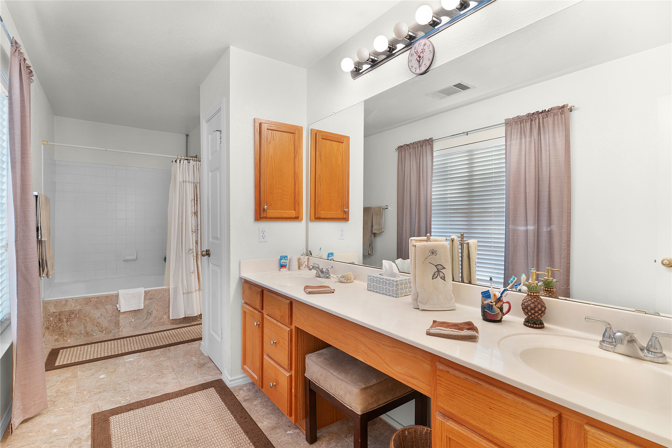 2305 Little Tree Bend Cedar Park, TX 78613 - Photo 31 of 40 a dining room with a sink and a mirror