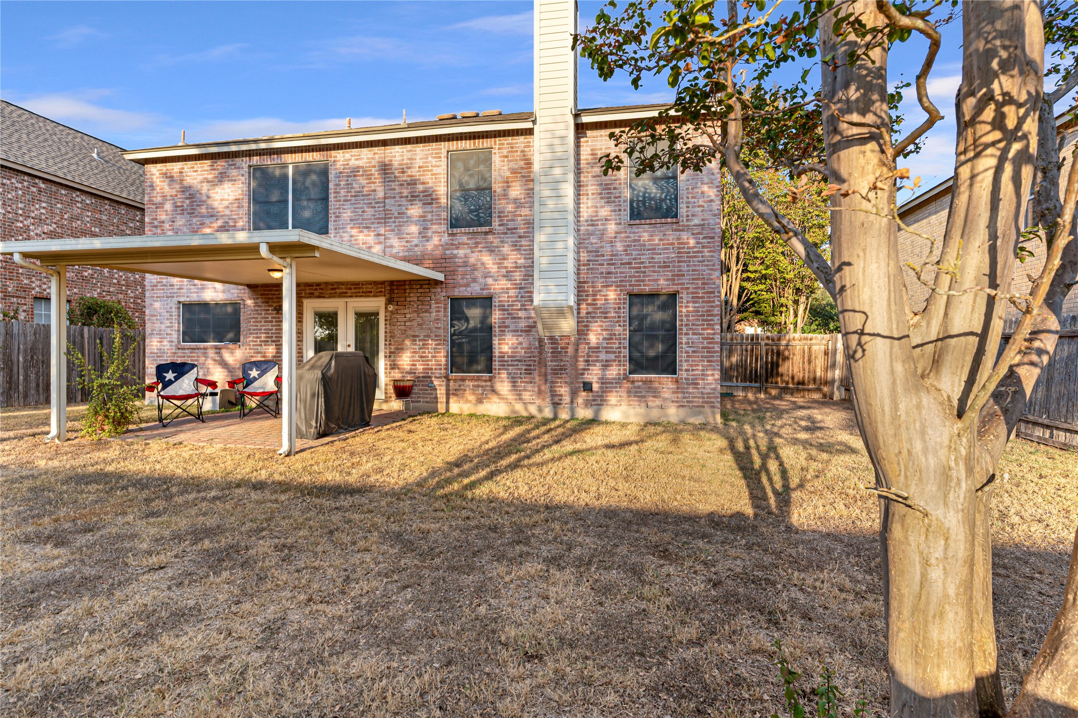 2305 Little Tree Bend Cedar Park, TX 78613 - Photo 33 of 40 a view of a house with a backyard