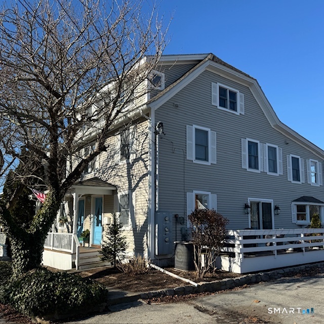 a front view of a house with a porch