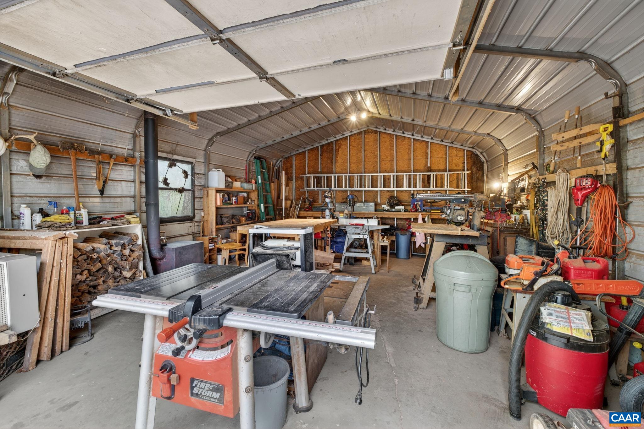 15405 Madison Run Road Gordonsville, VA 22942 - Photo 33 of 40 Workshop with woodstove