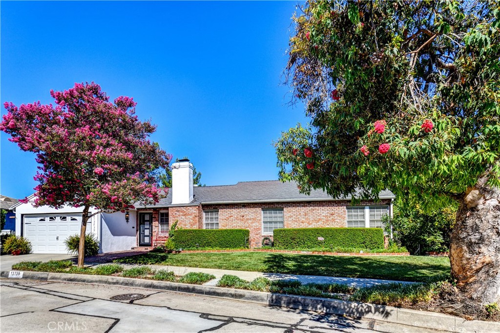 13739 Ridge Road Whittier, CA 90601 - Photo 2 of 42 a front view of a house with a yard