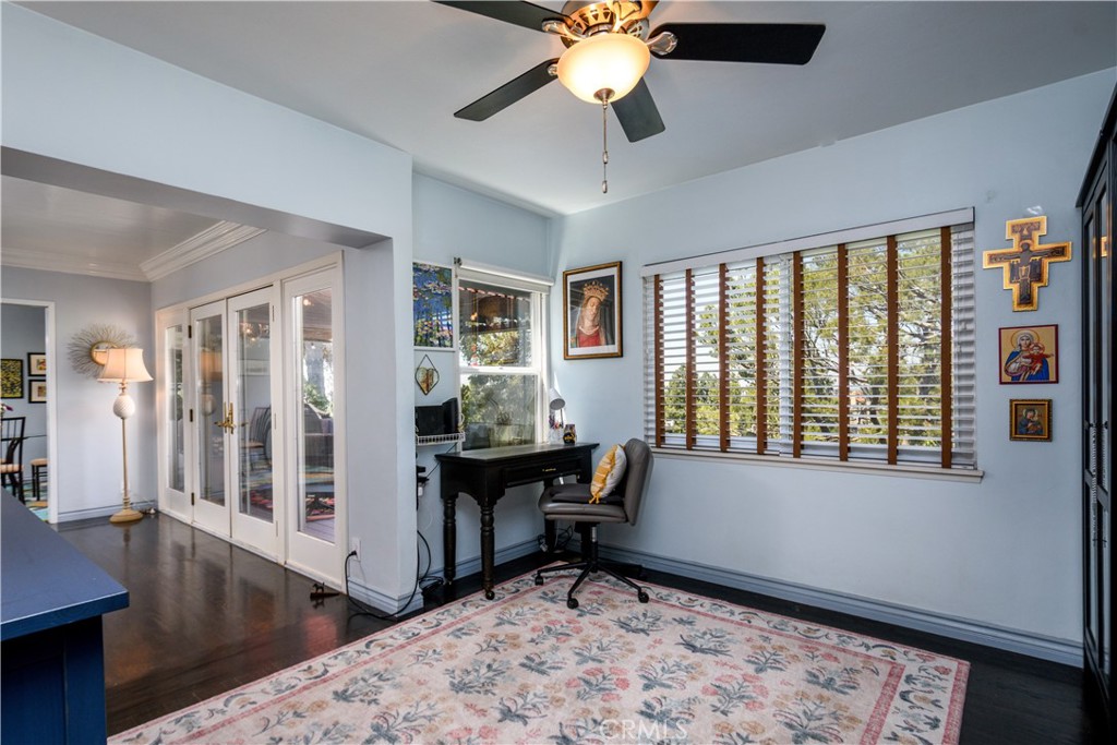 13739 Ridge Road Whittier, CA 90601 - Photo 22 of 42 a workspace with wooden floor and a window