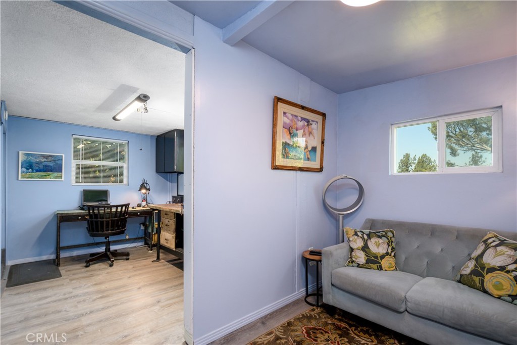 13739 Ridge Road Whittier, CA 90601 - Photo 30 of 42 a living room with furniture and a window