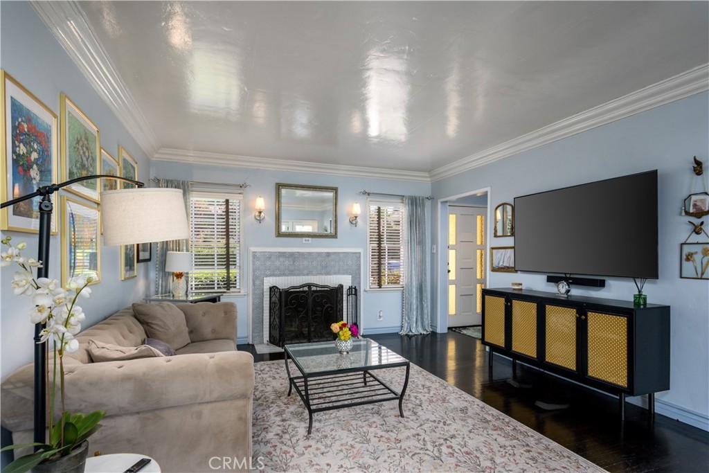 13739 Ridge Road Whittier, CA 90601 - Photo 3 of 42 a living room with furniture and a flat screen tv