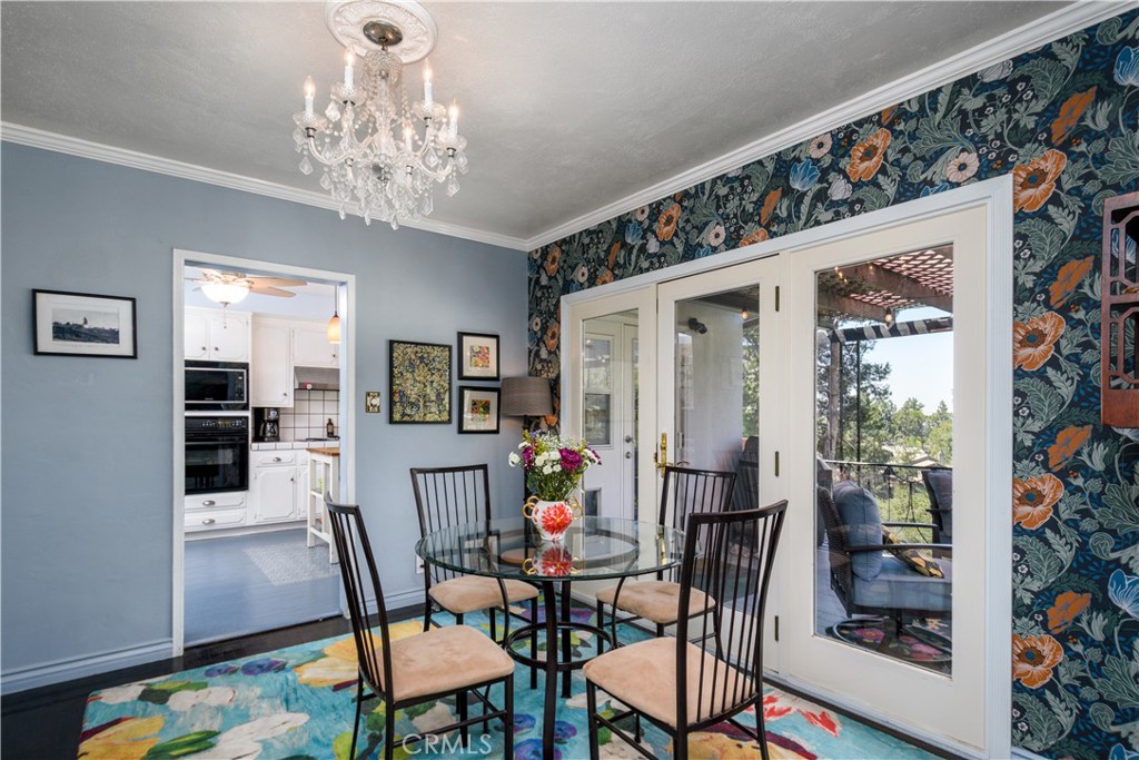 13739 Ridge Road Whittier, CA 90601 - Photo 8 of 42 a view of a dining room with furniture and wooden floor