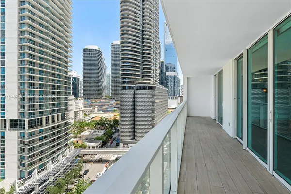 a balcony with view of the ocean