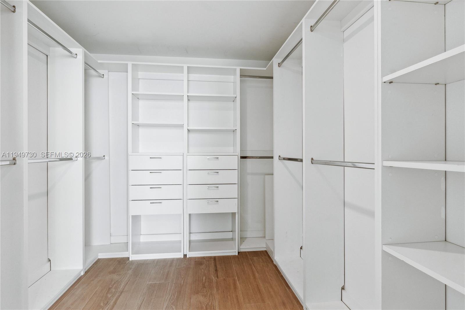 1080 Brickell Avenue, Unit 1401 Miami, FL 33131 - Photo 19 of 27 a view of walk in closet