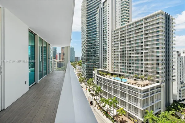 a balcony view with a garden space