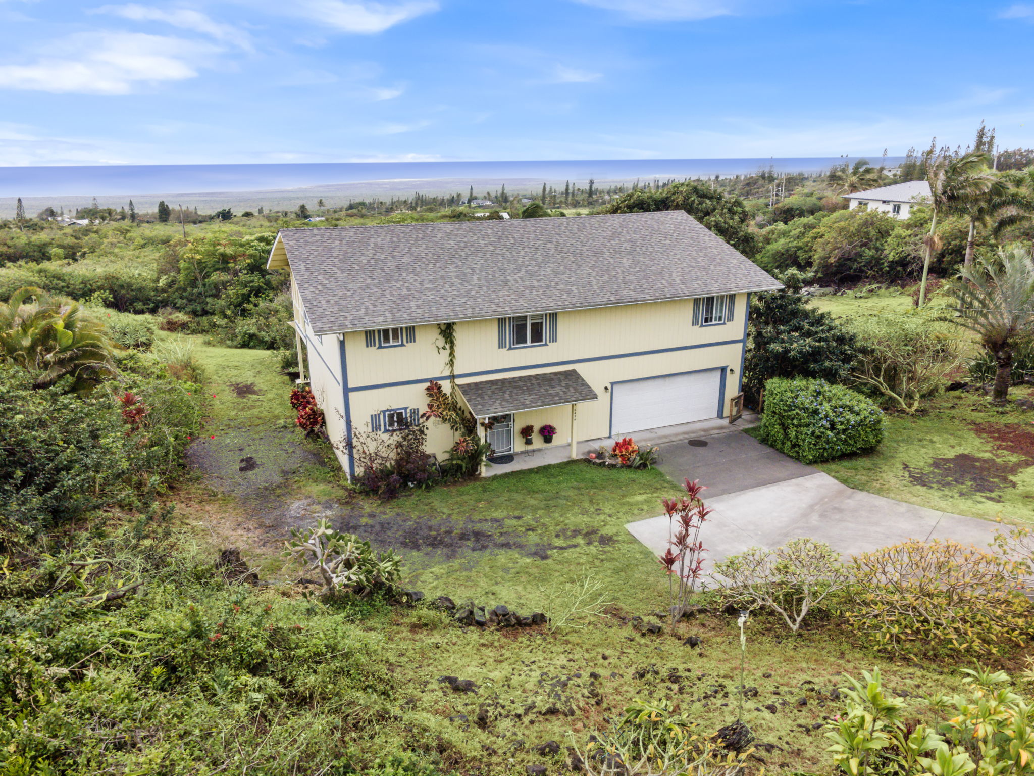 94-6494 Keoki Road Naalehu, HI 96772 - Photo 3 of 30 an aerial view of a house with a yard