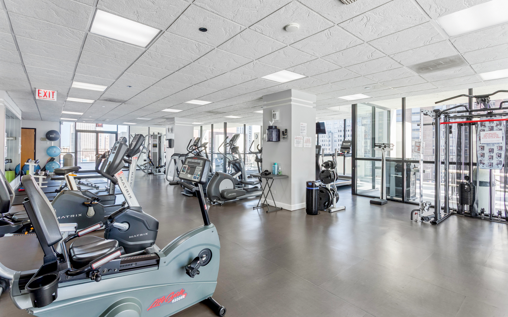 1122 North Clark Street, Unit 1203 Chicago, IL 60610 - Photo 18 of 22 a view of a room with gym equipment