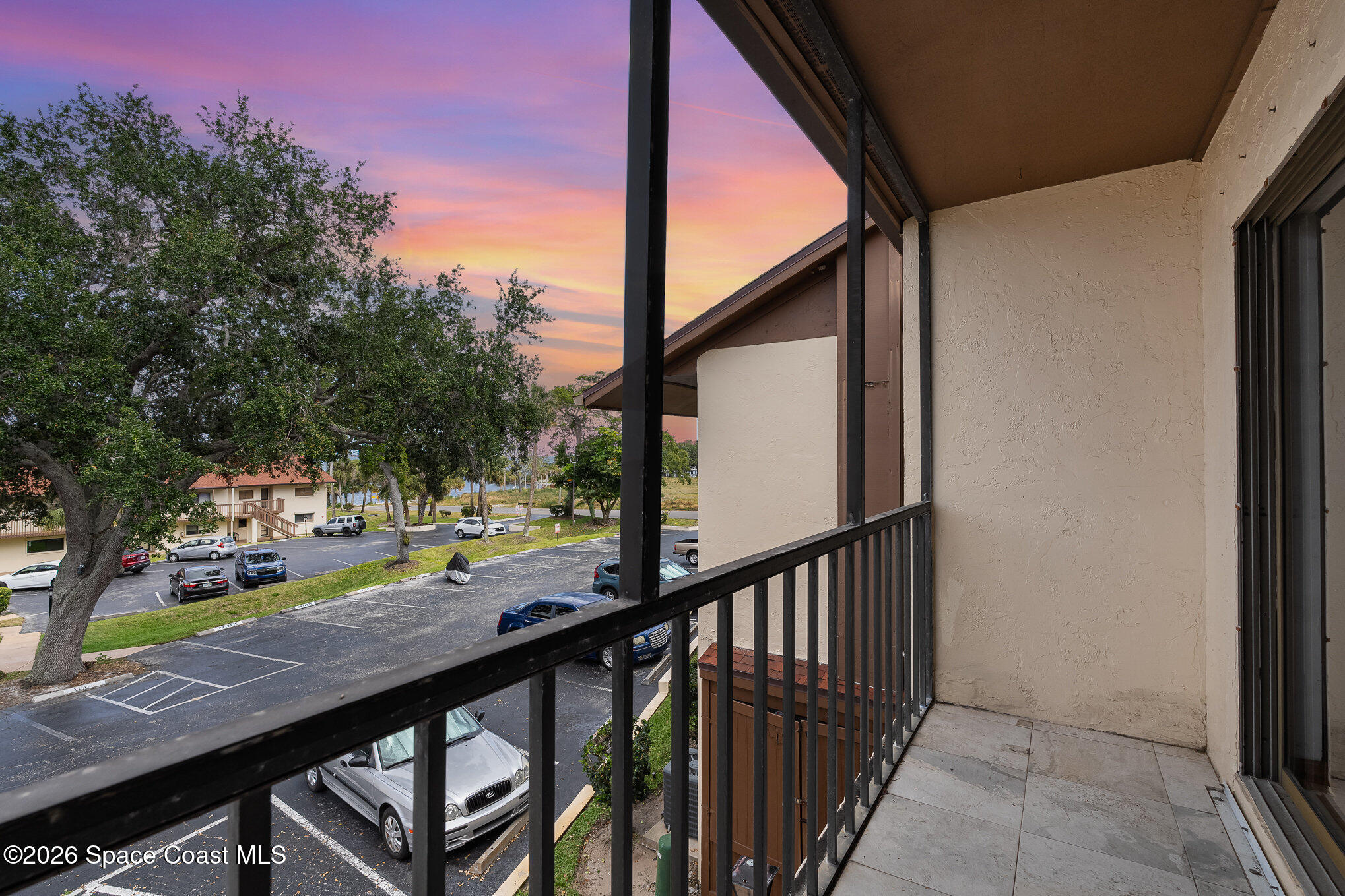 3021 Kirkland Road Northeast Palm Bay, FL 32905 - Photo 16 of 16 a view of a balcony with wooden floor