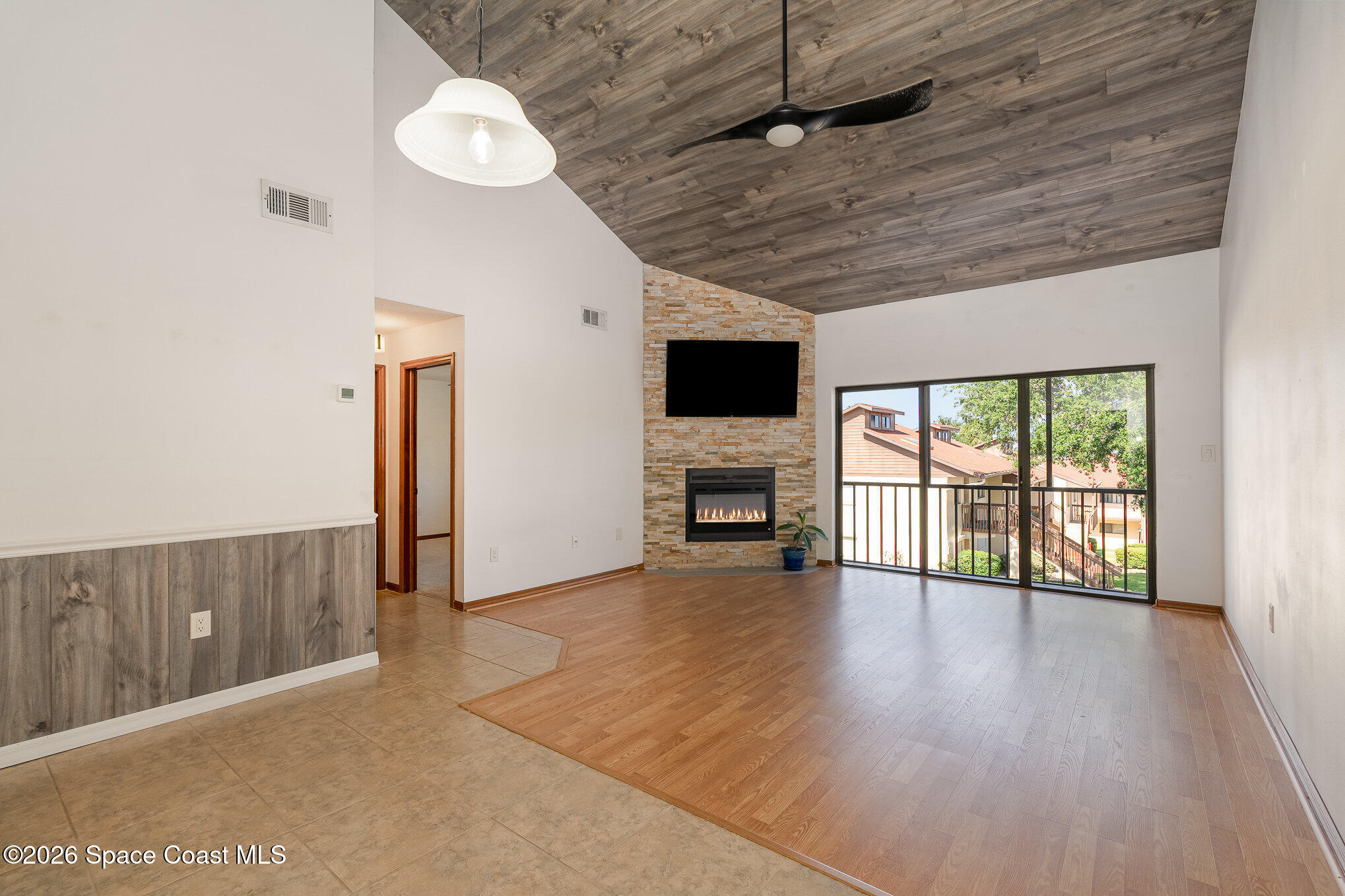 3021 Kirkland Road Northeast Palm Bay, FL 32905 - Photo 6 of 16 a view of livingroom with furniture wooden floor and window