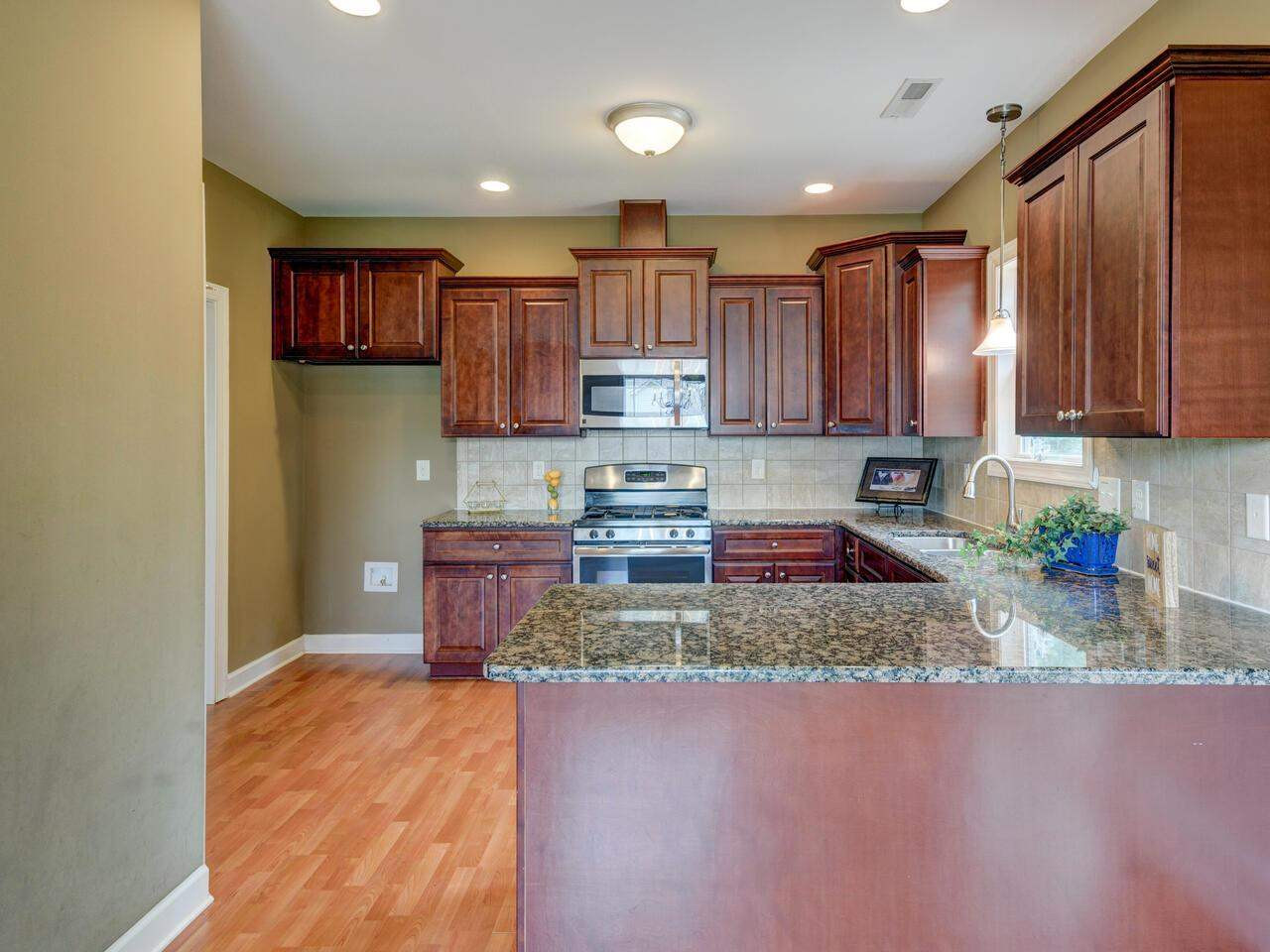 2195 Matthews Road Clayton, NC 27520 - Photo 10 of 30 Kitchen with Huge Bar Space