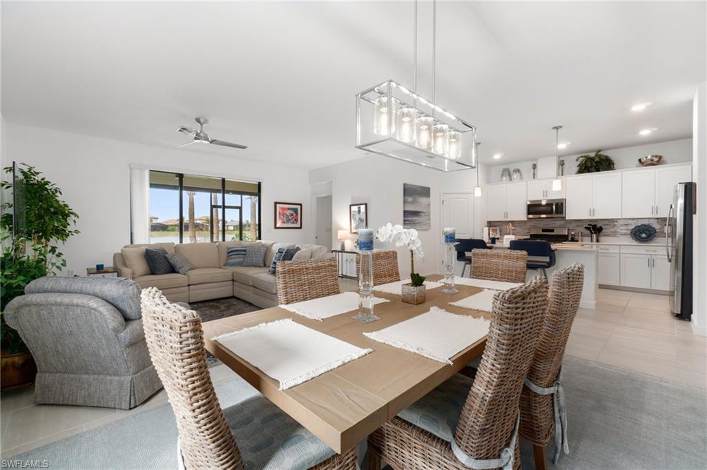 20238 Millrun Drive Estero, FL 33928 - Photo 11 of 41 a view of a dining room with furniture