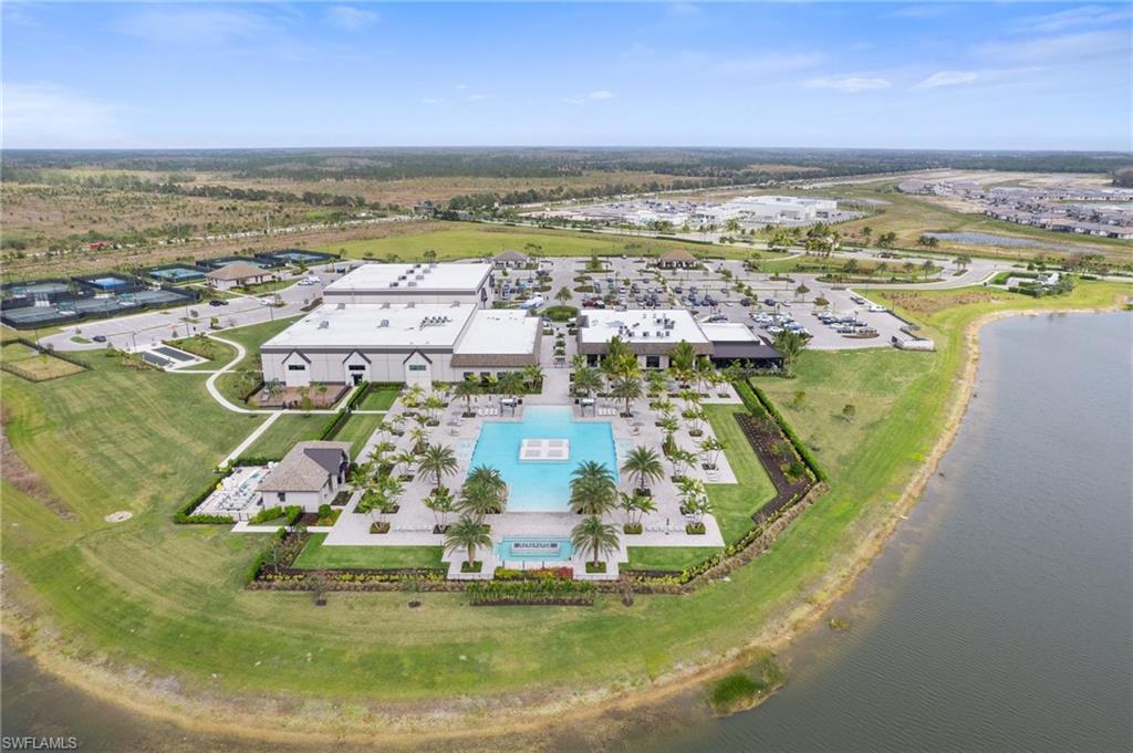 20238 Millrun Drive Estero, FL 33928 - Photo 33 of 41 a view of a swimming pool with a ocean view