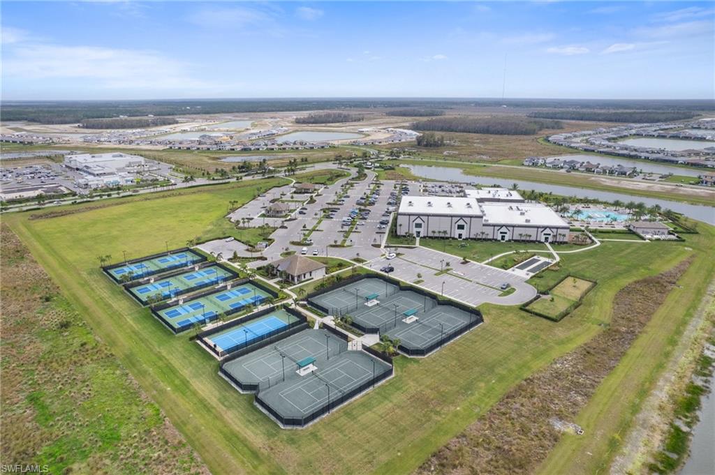 20238 Millrun Drive Estero, FL 33928 - Photo 34 of 41 an aerial view of a city