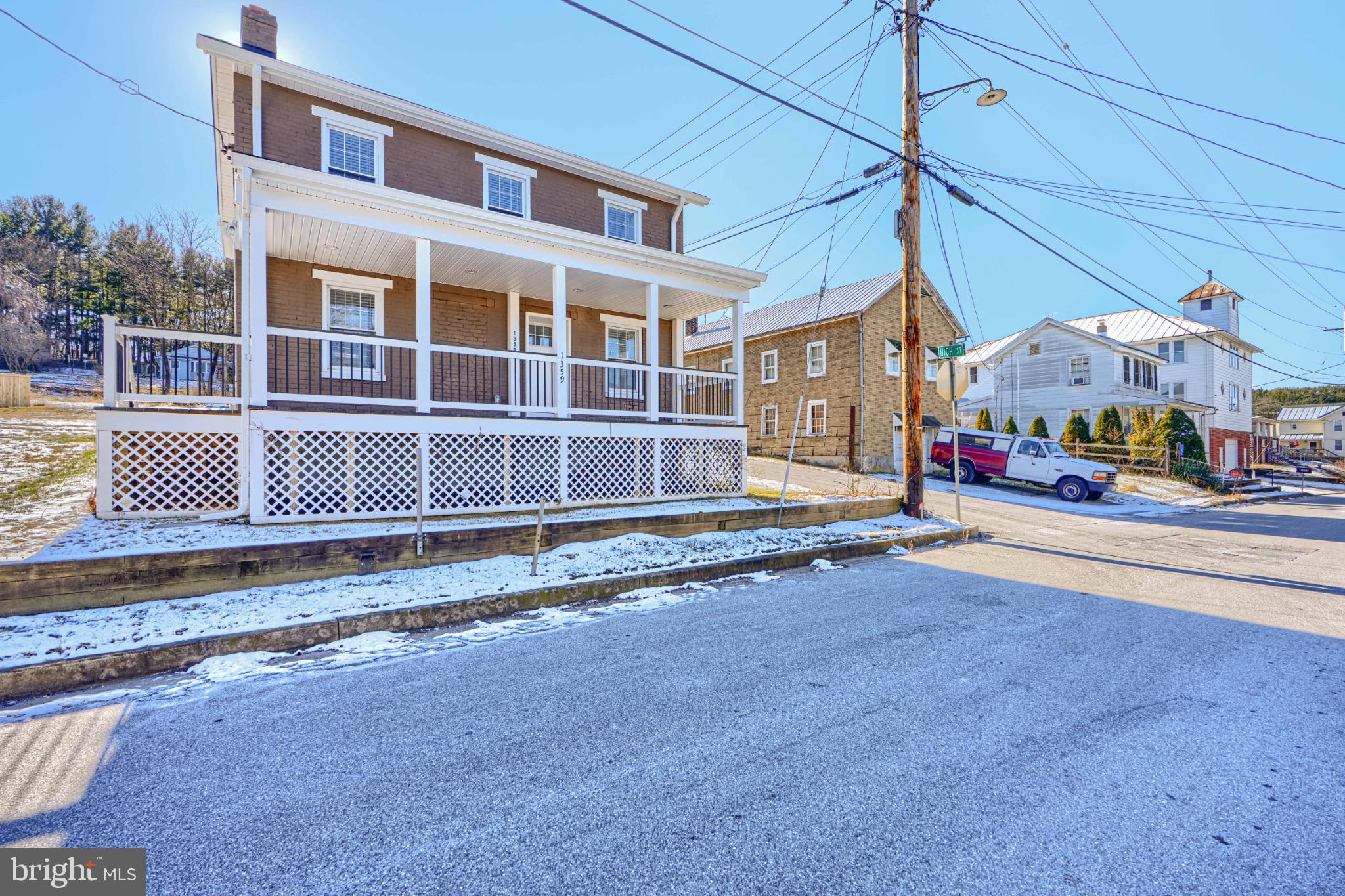 Charming home with inviting porch and views.