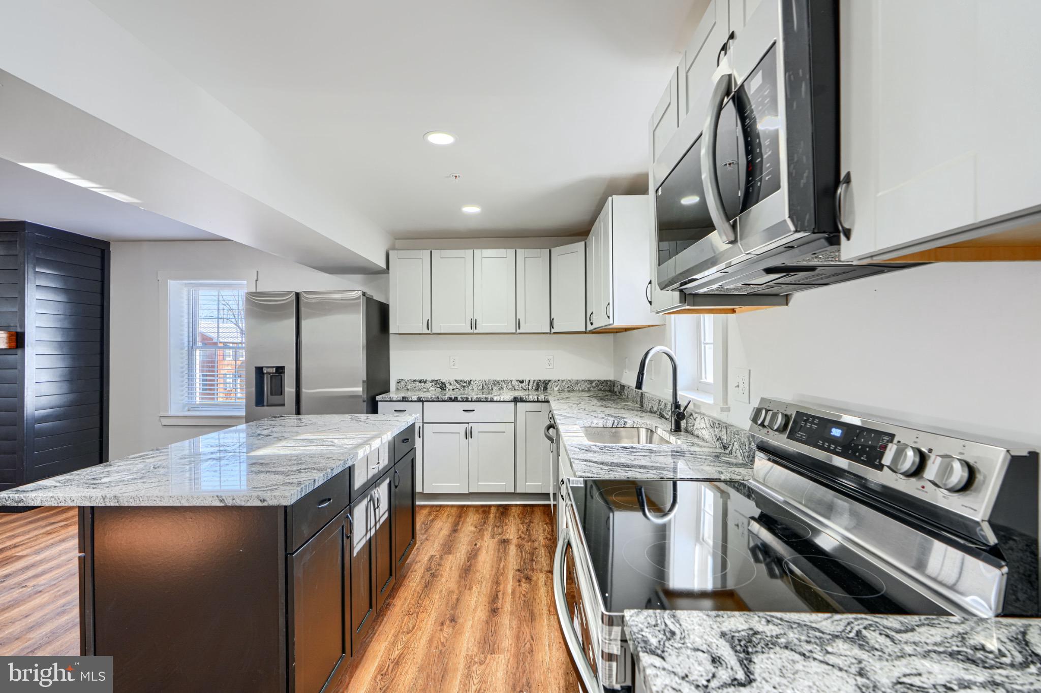 1359 Pleasant Valley Road Westminster, MD 21158 - Photo 16 of 57 Modern kitchen with sleek finishes.