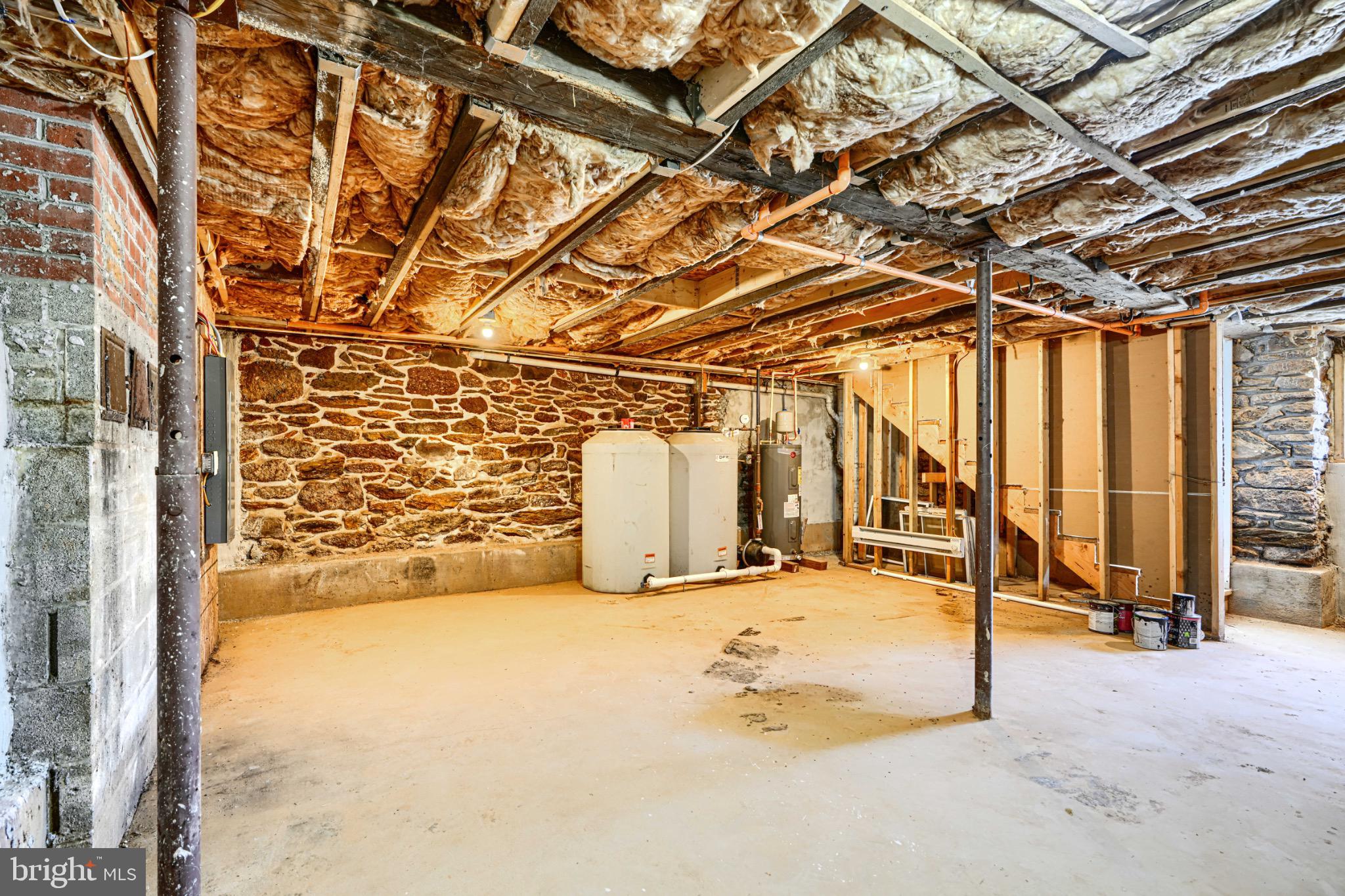 1359 Pleasant Valley Road Westminster, MD 21158 - Photo 44 of 57 Spacious unfinished basement with rustic charm.