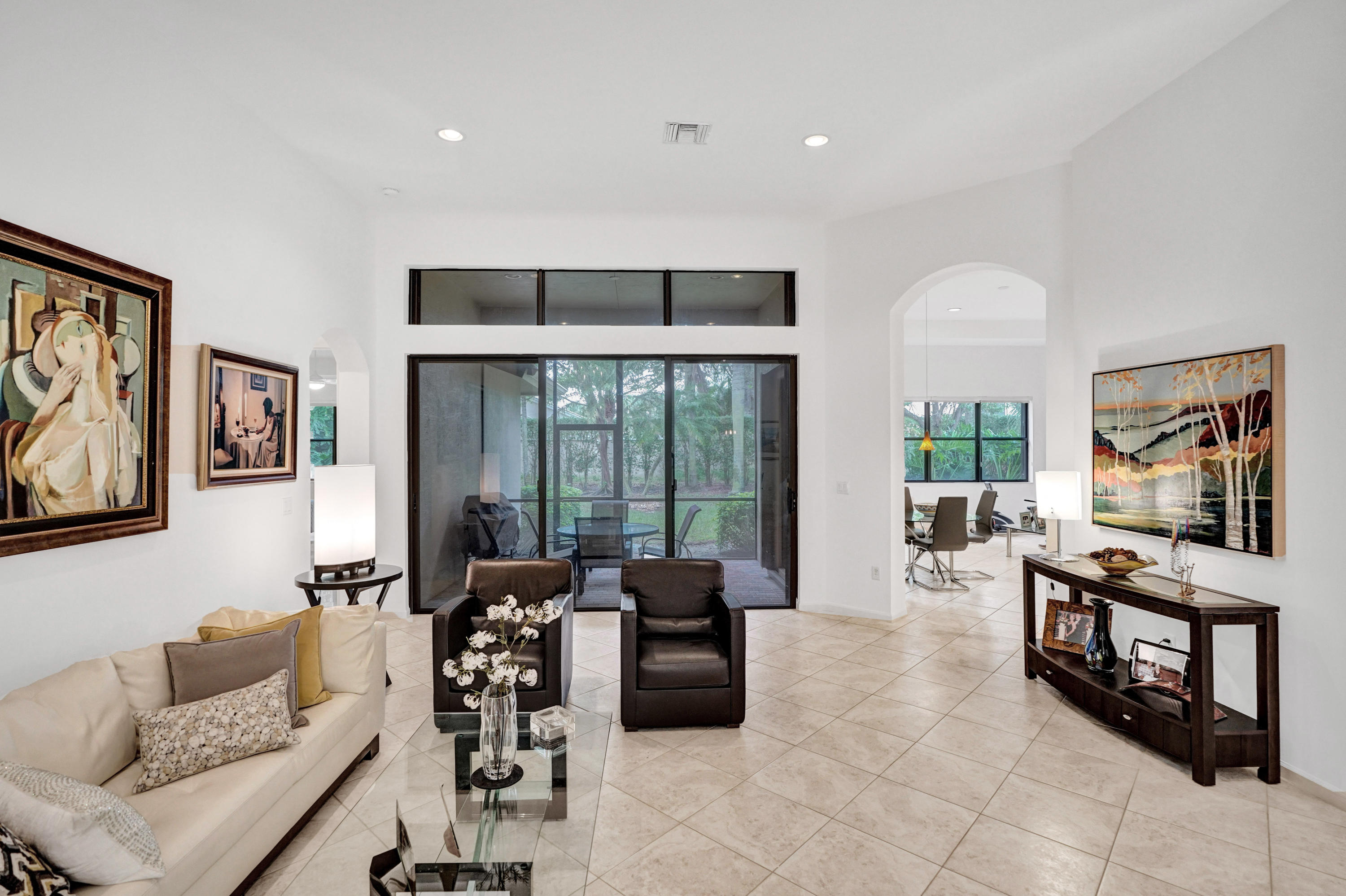7849 Via Grande Boynton Beach, FL 33437 - Photo 12 of 59 a living room with furniture and large windows