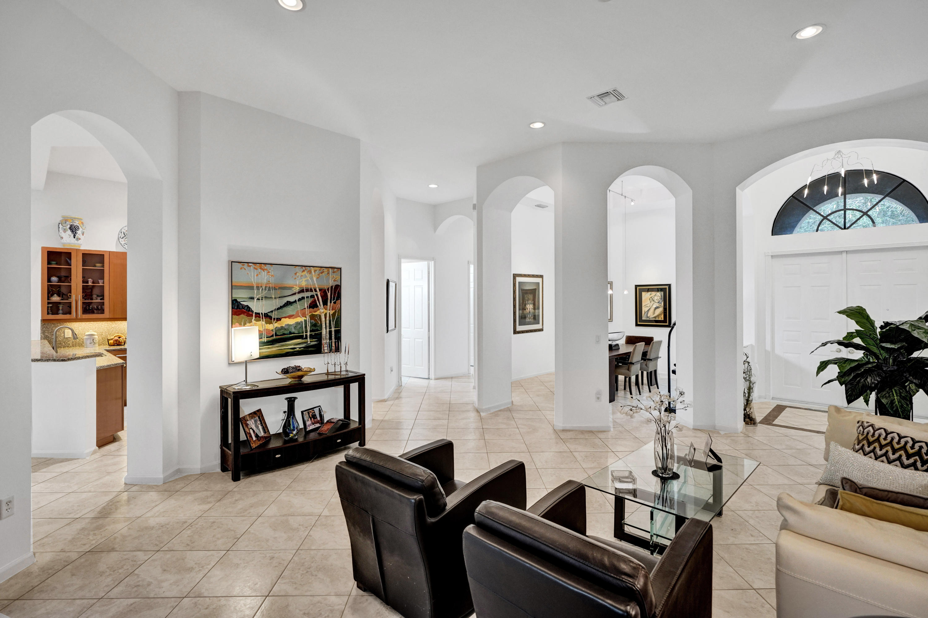 7849 Via Grande Boynton Beach, FL 33437 - Photo 15 of 59 a living room with furniture and a flat screen tv