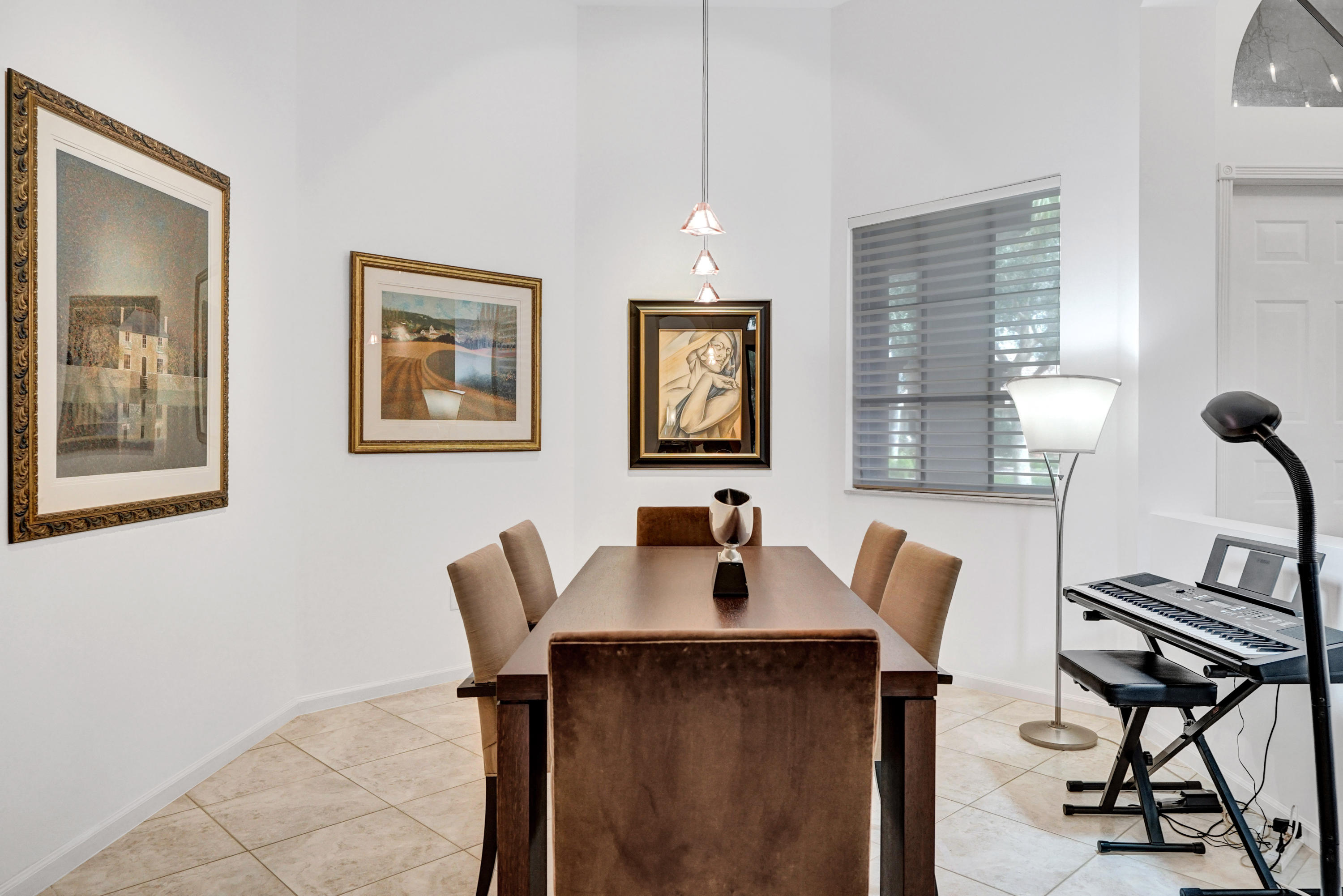 7849 Via Grande Boynton Beach, FL 33437 - Photo 18 of 59 a view of a workspace with furniture and a window